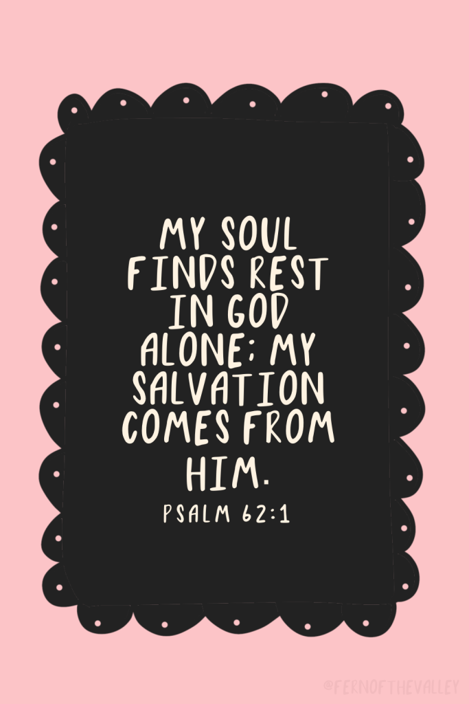Inspirational Christian Bible verse printable from Psalm 62:1 on a soft pink background with black scalloped frame. Hand-lettered quote reads ‘My soul finds rest in God alone; my salvation comes from Him.’ Ideal for Christian wall art, phone wallpaper, faith encouragement, anxiety relief, mental health devotionals, and Scripture reminders by Fern of the Valley.
