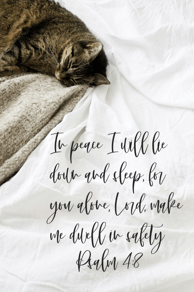 How to Pray for Peace When Anxiety Wakes You at Night: A cozy tabby cat sleeping peacefully on a soft gray blanket, with the comforting verse from Psalm 4:8 overlaid in elegant script: ‘In peace I will lie down and sleep, for you alone, Lord, make me dwell in safety.’